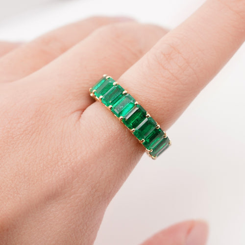 8.18 / 0.47 cts Octagon Emerald with Yellow Diamond Pavée Eternity Ring