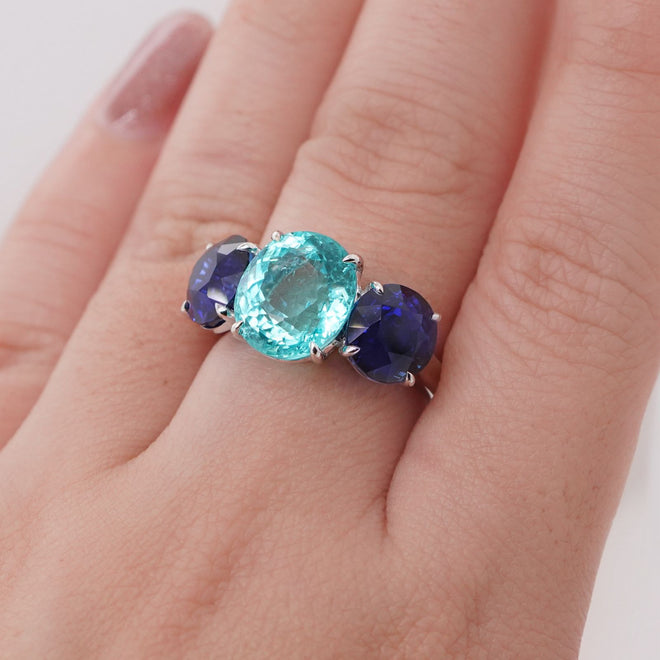 RG-25003-4.898  3.52  3.17 cts Oval Paraiba with Blue Sapphire Ring