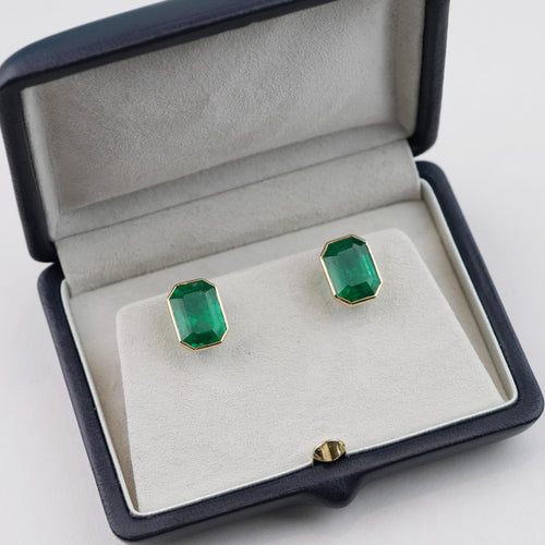 ee-25022-4.743  4.506 cts Minor Oil Octagon Emerald Studs