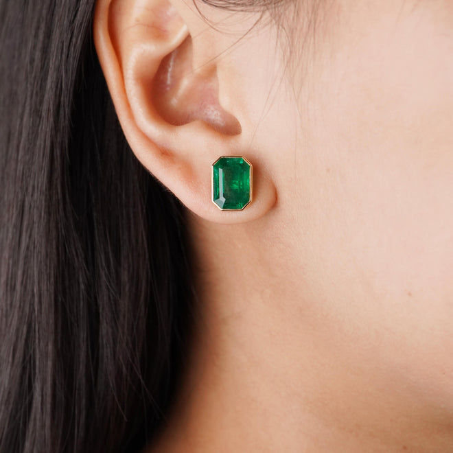 ee-25022-4.743  4.506 cts Minor Oil Octagon Emerald Studs
