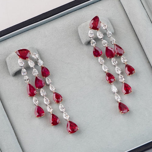 er-25004-19.26  5.13 cts Pear Shape Ruby with Diamond Earrings