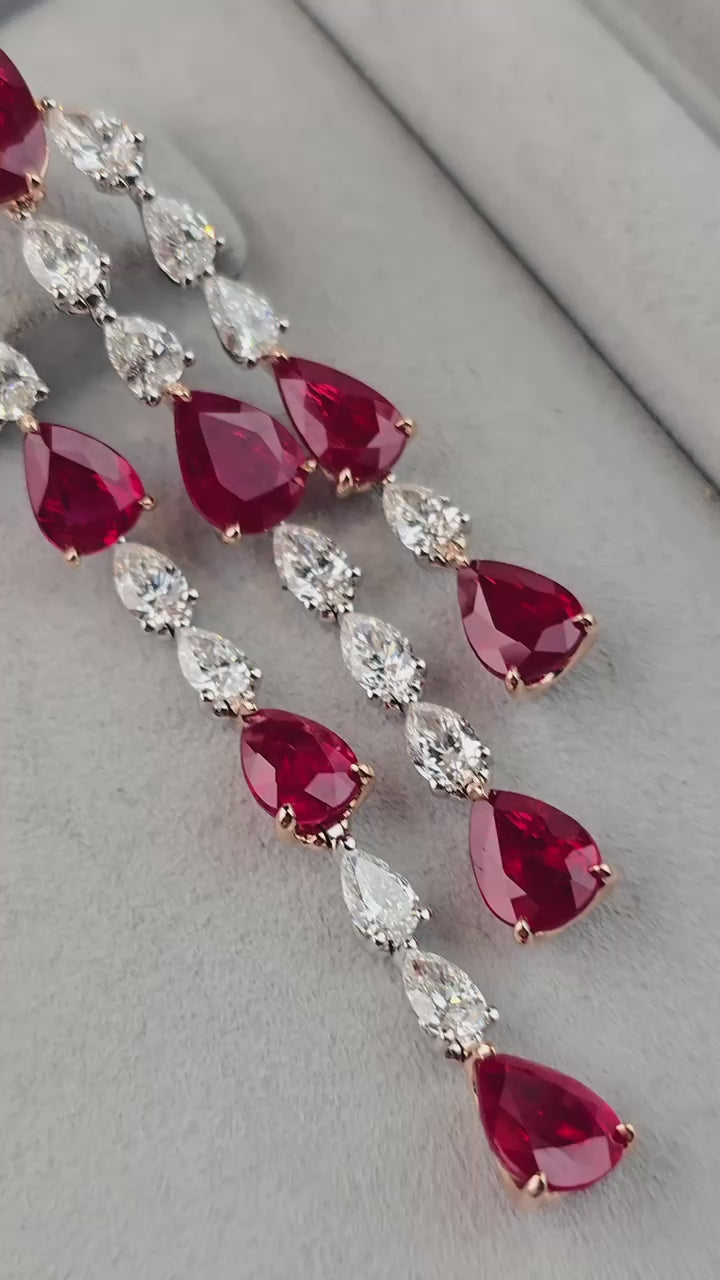 er-25004-19.26  5.13 cts Pear Shape Ruby with Diamond Earrings