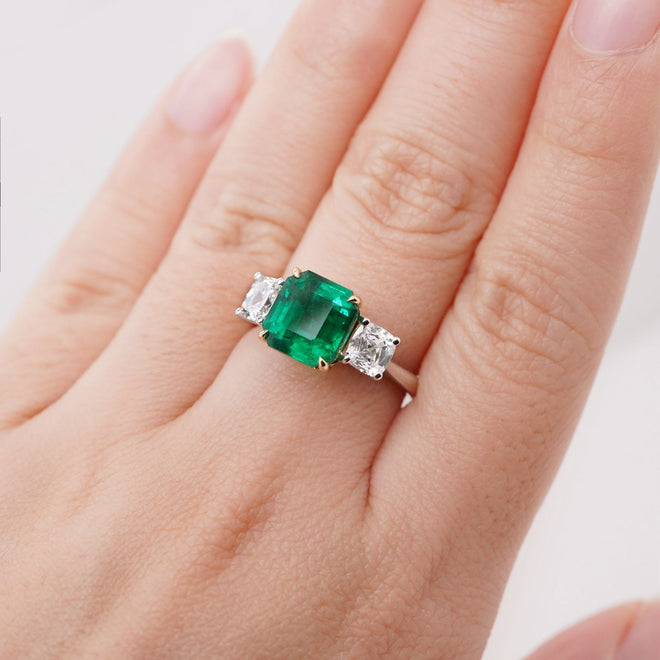 re-25036-3.17  0.60  0.57 cts Minor Oil Octagon Emerald with Diamond Ring