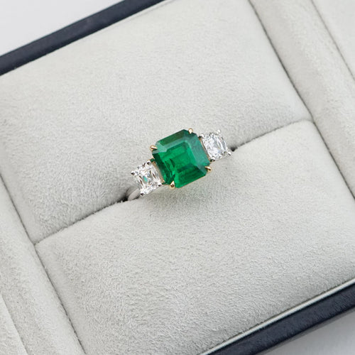 re-25036-3.17  0.60  0.57 cts Minor Oil Octagon Emerald with Diamond Ring